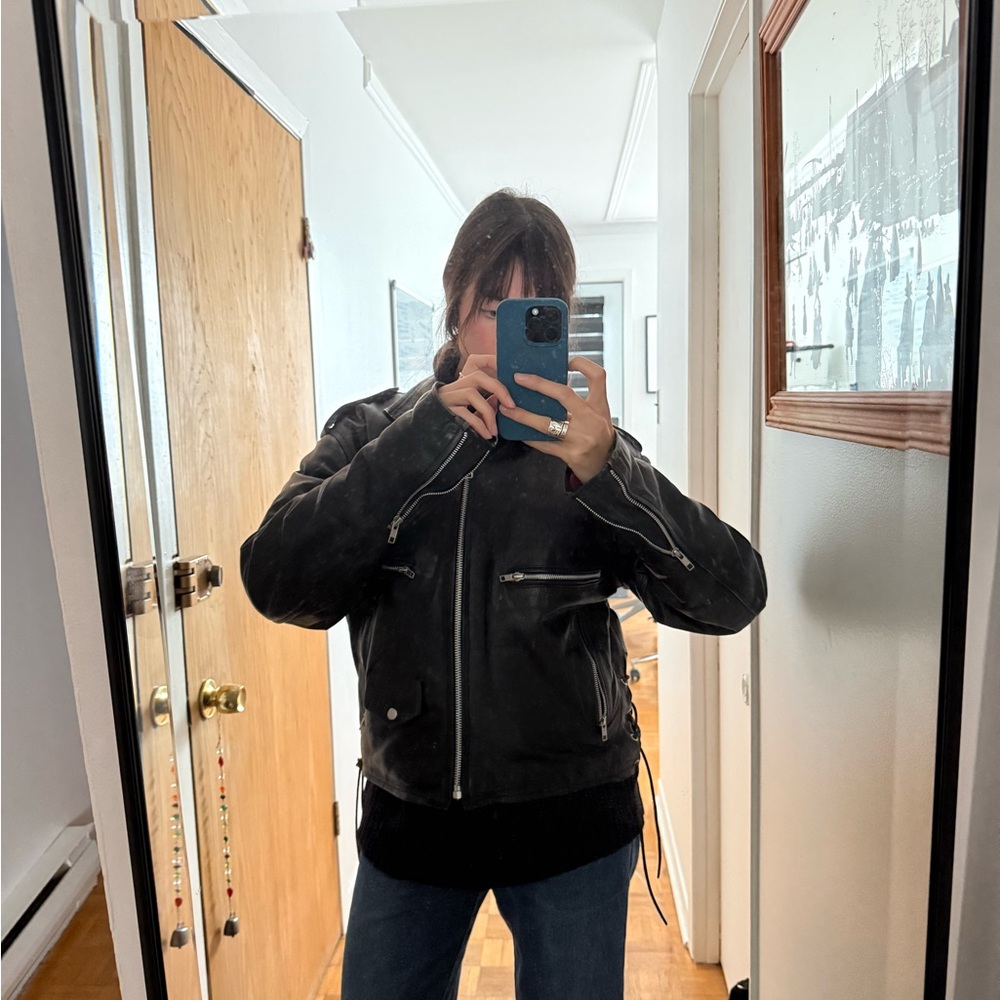 Black Leather Jacket with Zipper Details